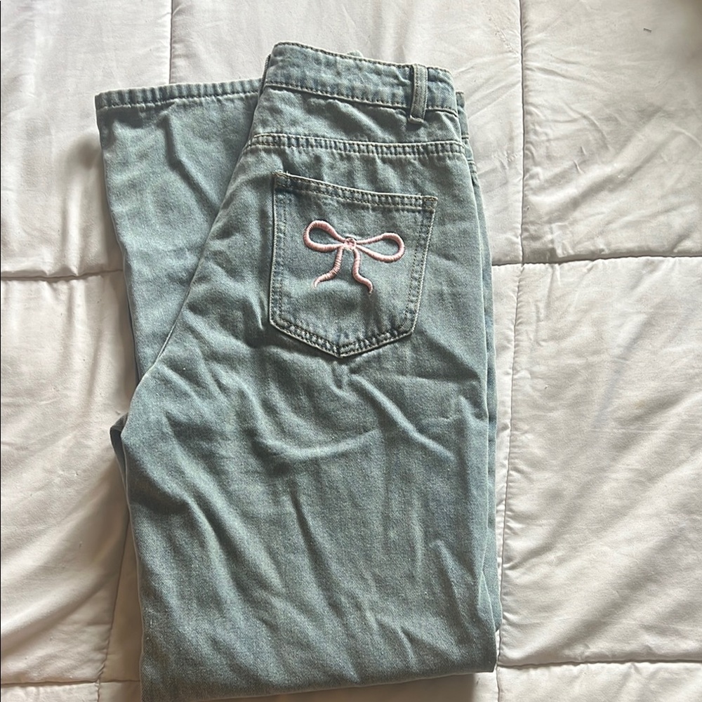 High Rise Jeans with Pink Bow Detail